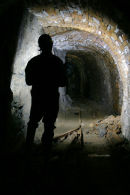 D9 120 Silhouette of a Caver in Mine Passage Brownley Hill Mine Cumbria